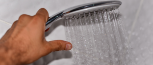 What is the average water usage per person per month?